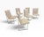 Exceptional vintage set of six Milo Baughman “Thin Line” upholstered dining chairs, dating to the 1970s. Celebrated for...