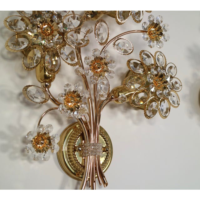 4 light Sconces / Apliques by Palwa ( Germany ) Each sconce consistent in 3 lights , which are located behind the crystal...