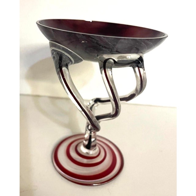 An exceptional hand-blown art glass centerpiece attributed to Jozefina Glassworks of Krosno, Poland, celebrated for its...