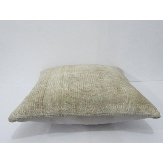 Decorative pillow cover made from a vintage Turkish handknotted rug. Backed with good quality cotton fabric. Pillow...