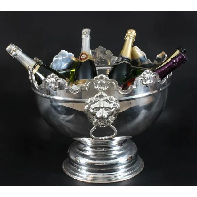 This is a large Vintage silver plated Monteith punch bowl dating from the late 20th Century. The punch bowl can also...