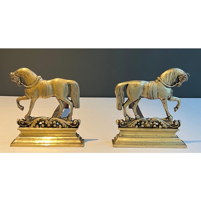 This beautiful pair of andirons is made of bronze. It is a French work. Circa 1970.
