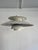 This iconic ph5 pendant lamp by louis poulsen is a masterpiece of form and function. The soft, glare-free glow creates...