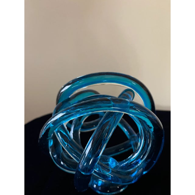 "Blue Ocean Swirl" is a unique piece of Glass Art. The multi-blue colors react to light for a stunning glow. Each side...