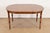 A gorgeous mid-century Hollywood Regency extension dining table, breakfast table, or game table In the manner of Baker...