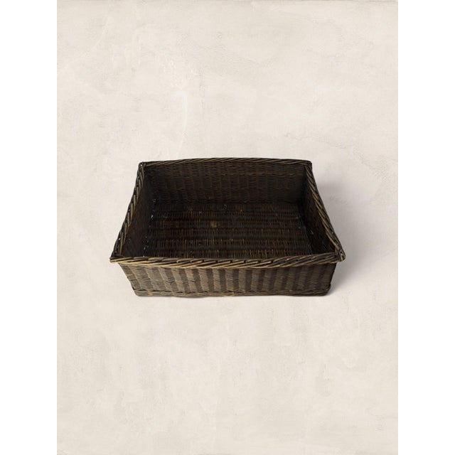 A generously sized French willow basket dating to circa 1920. Handwoven in a low rectangular form, this antique basket...