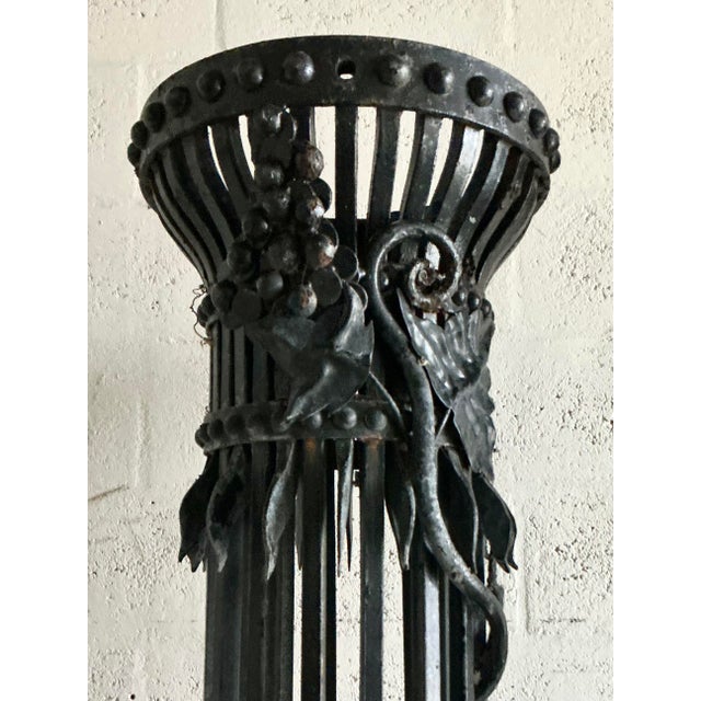 Create an entrance of unparalleled grandeur with this pair of monumental vintage wrought iron columns. Channeling the...