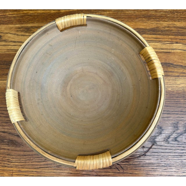 A unique bowl with wrapped handles. Unmarked.