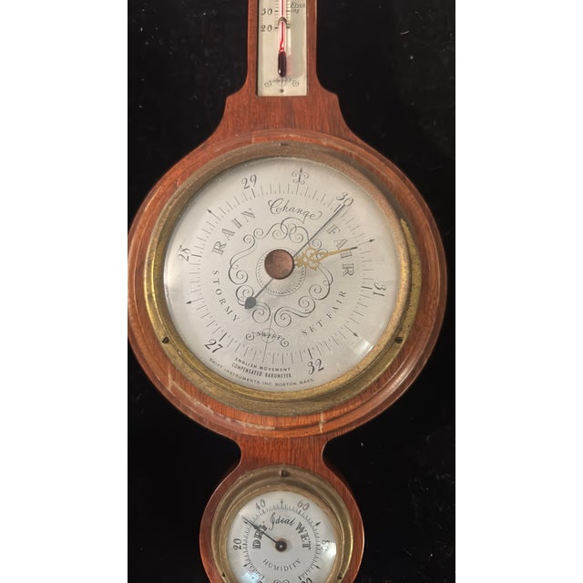 A classic mid-century aneroid home barometer produced by the renowned Swift Instruments Inc. of Boston, Mass. Known...