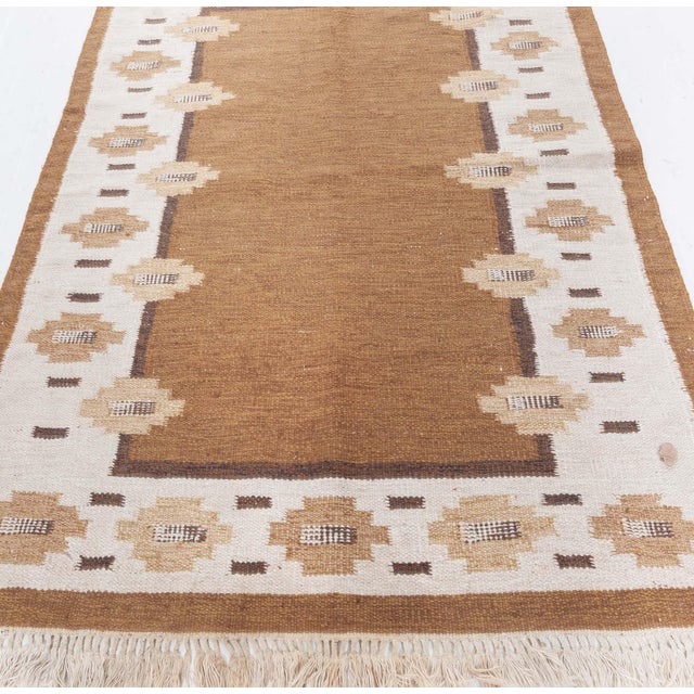 Vintage Swedish Flat Woven Rug Size: 4'5" × 6'3" (134 × 190 cm) This charming vintage Swedish flat-woven rug, dating to...