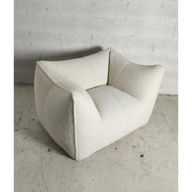 Very good condition, the upholstery has been expertly redone in an original super bouclé, only the original lower part...