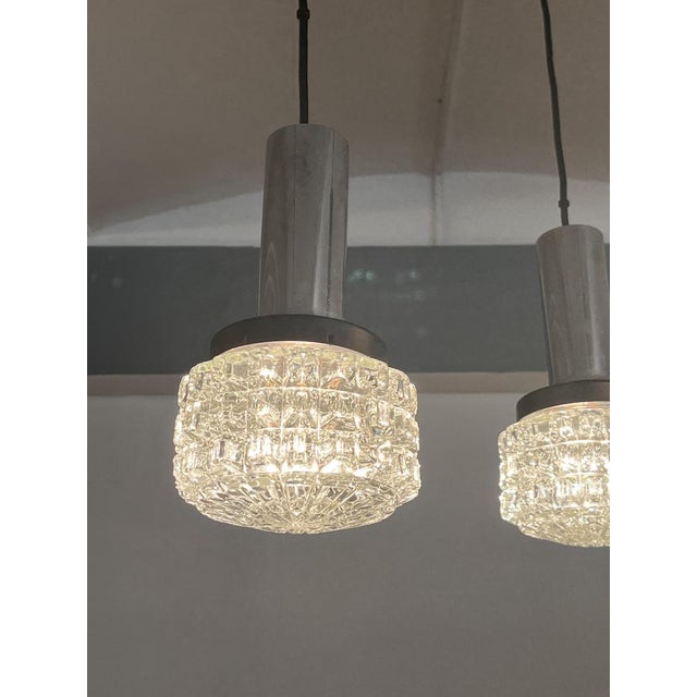 Mid-Century Cascade Chandelier 3-arm, Teak/Metal/Fabric Cable/Glass European Plug (up to 250V).The wiring of this item may...