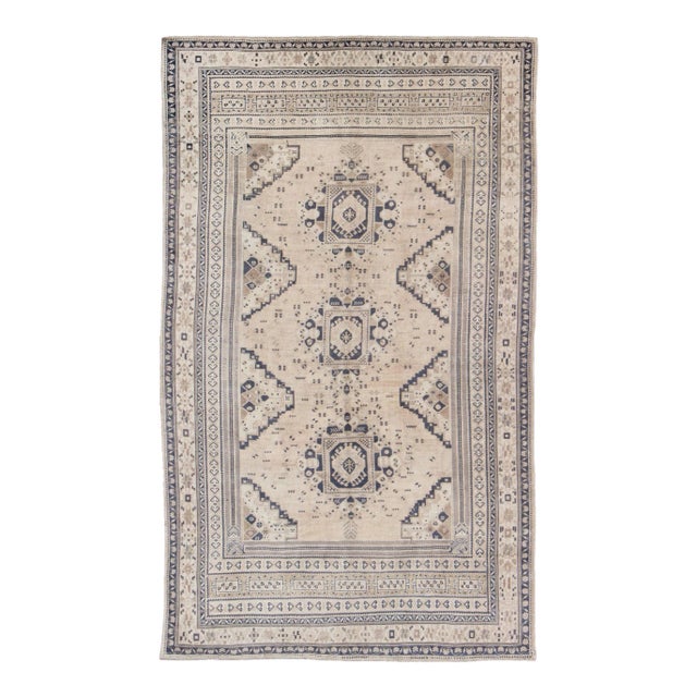 Vintage Turkish Oushak Rug Featuring Soft Beige Field With Navy Tribal Design For Sale