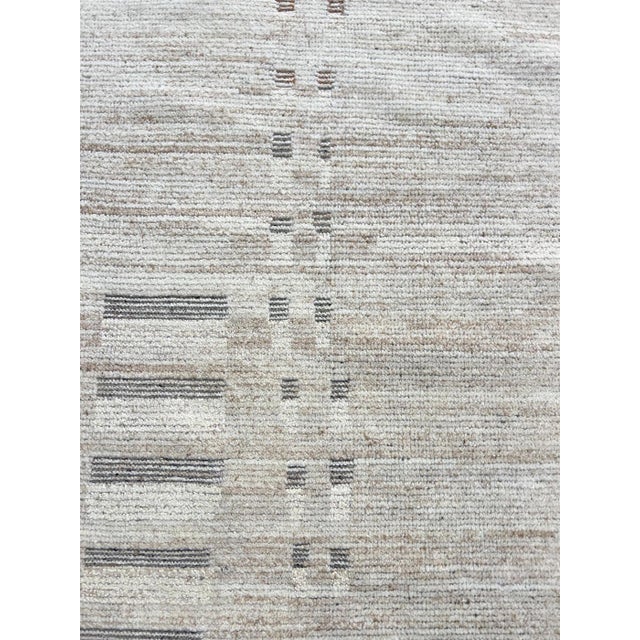 Beautiful hand knotted modern rug. Made of 75% wool and 25% silk with very modern design and colors, this extremely...