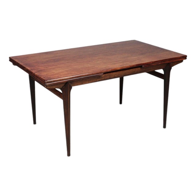 1950s Attributed to Johannes Andersen Jet Age Draw Leaf Dining Table in Rosewood For Sale