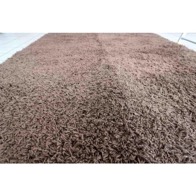 Vintage Swedish shag rug in chocolate brown color. The rug is from the end of 20th century in original good condition. It...