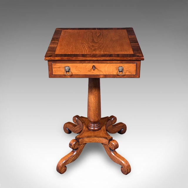 This is a vintage Regency revival side table. An English, oak and walnut accent or end table, dating to the Art Deco...