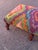 A one-of-a-kind vintage ottoman upholstered in a richly colored kilim textile, featuring a striking geometric pattern in...