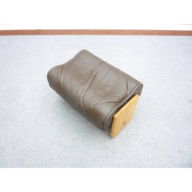Very rare leather footstool by Otto Zapf. Model "Follow Me. First-hand and bought by Möbel Behr in the 1978s. Very good...