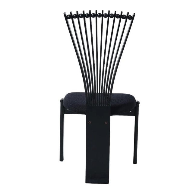 Set of 4 Totem Dining Chairs Fabulous postmodern dining chairs attributed to Torstein Nilsen. The Totem Chair features a...