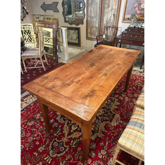 Wonderful hard to find weathered heavy French oak farm table having tapered legs and two drawers at the ends, one working....