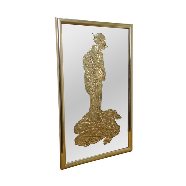 Mid 20th Century rectangular wall / vanity mirror featuring a gold embossed geisha. Dimensions: 17.25" x 0.75" x 27.25" /...