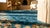 Royal Blue Vibrant Blue Color With Gold Figurative Borders Antique Chinese Peking Rug For Sale - Image 8 of 10