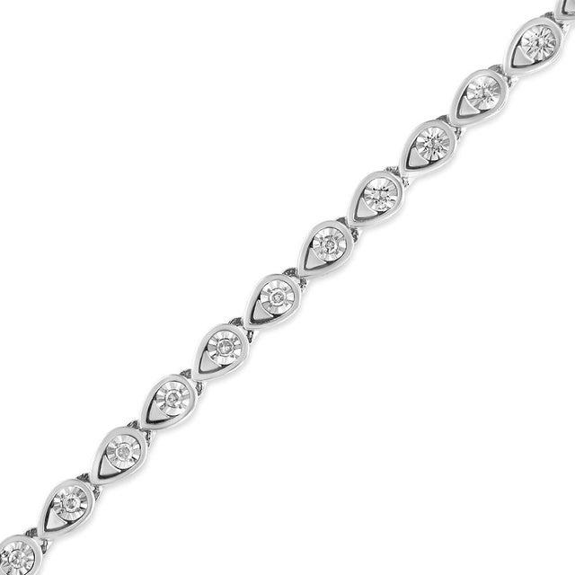 Ready for any occasion, this diamond link bracelet is sure to become a daily favorite. Crafted from cool weaves of .925...