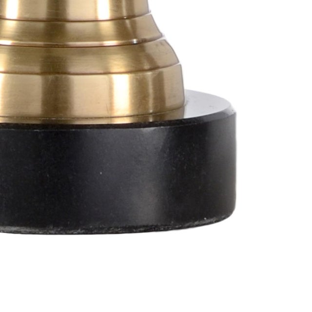 Enhance the modern aura in your home with milo lamp. Perfect for a small space, this brass lamp features a minimalist...