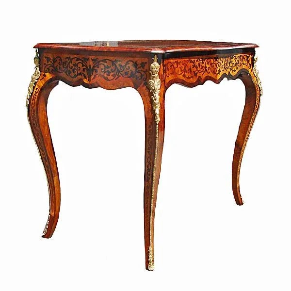 A fine Italian side or sofa table decorated with elaborate floral inlay in various fruitwoods. There is a hidden drawer in...