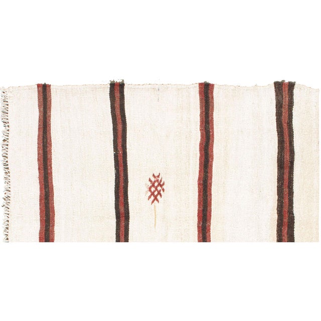 A vintage Turkish hand woven hemp Kilim. The simplicity and boldness of this piece gives a contemporary feel and can look...