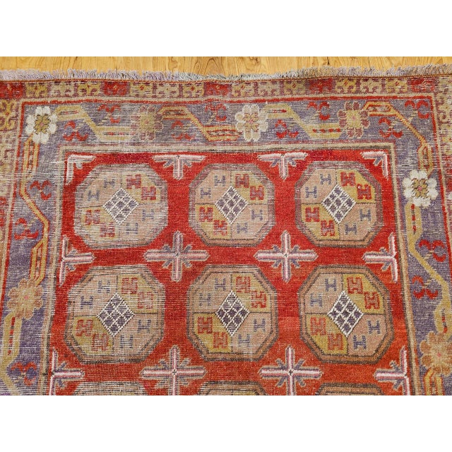 19th Century Khotan Rug in Allover Geometric Pattern in Red, Lavender, Ivory, Green For Sale - Image 9 of 16
