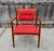 Jens Risom model C-160 walnut armchair c. 1957. Solid walnut frame with beautiful wood grain. Nubby orange/red upholstery...