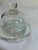 Classic vintage clear glass butter dish complete with domed lid and knob finial. Simple, elegant pressed glass style that...