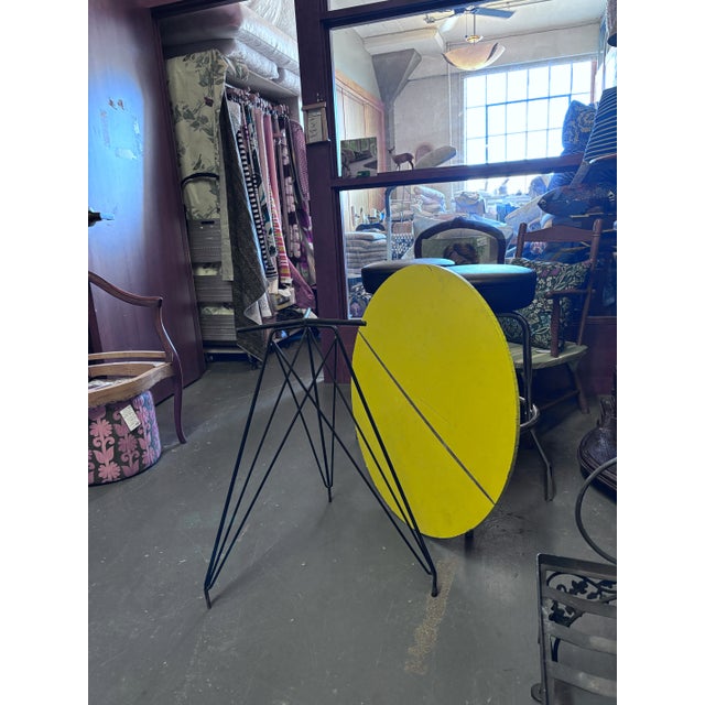 31.75" diameter Eiffel base: 27.25" tall. With 1/2"-ish round plyboard screwed on top, it's 27.75" tall. This listing...