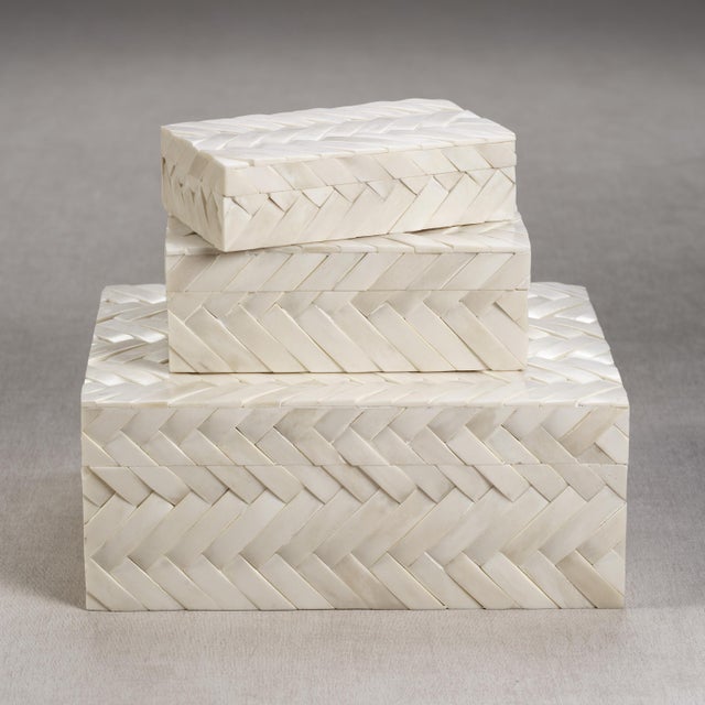 Braid pattern natural bone depicts a graphic design in this off- white decorative box. The best way to keep your small...