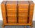 French Moderne Style Leather-Strapped Six-Drawer Chest in the Manner of Jacques Adnet This French moderne-style leather-...