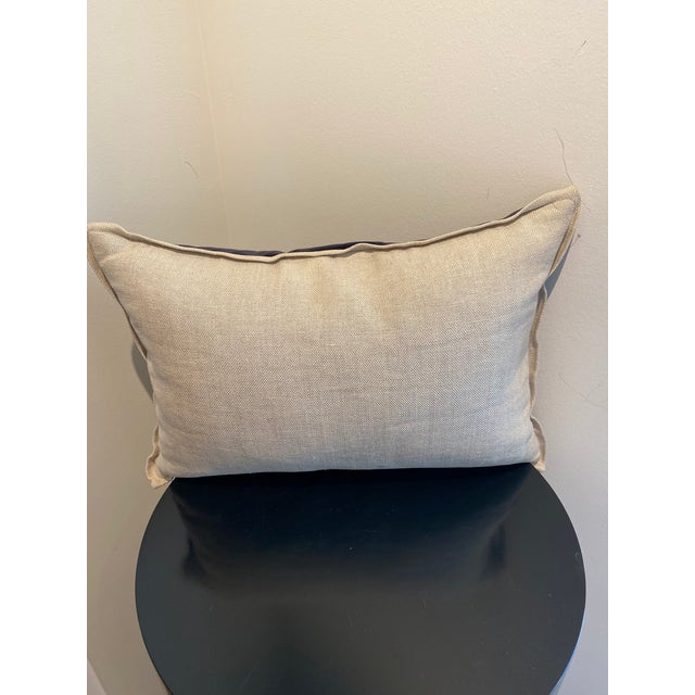 This elegant lumbar pillow features a rich, deep navy blue velvet fabric that offers both a luxurious feel and a...