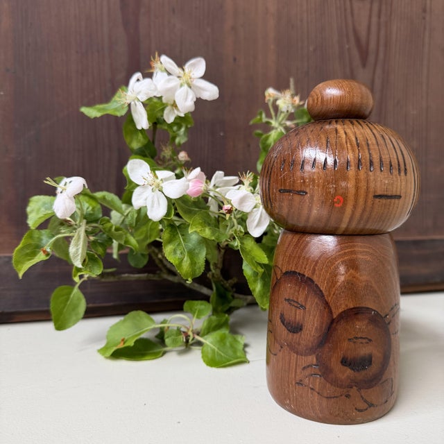 Special vintage sōsaku kokeshi by Kazuo Takamizawa, titled “Kantsubaki” or “Camellia Girl”, referring to the winter...