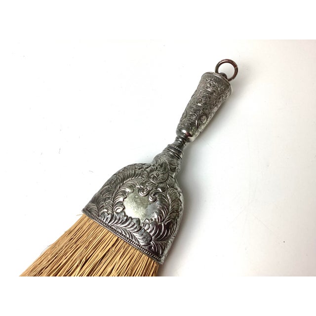 Vintage Floral Repousse Silver Plated Handle Whisk Broom. I do not see any marks on the silver handle. It measures 11...