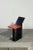 Original auxiliary or pedestal table with a radical postmodernist design, composed of folded sheets painted in black, and...