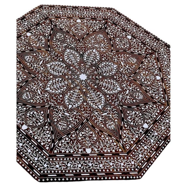 A highly decorative handmade Indian octagonal side table, finely crafted from richly toned Indian rosewood and extensively...