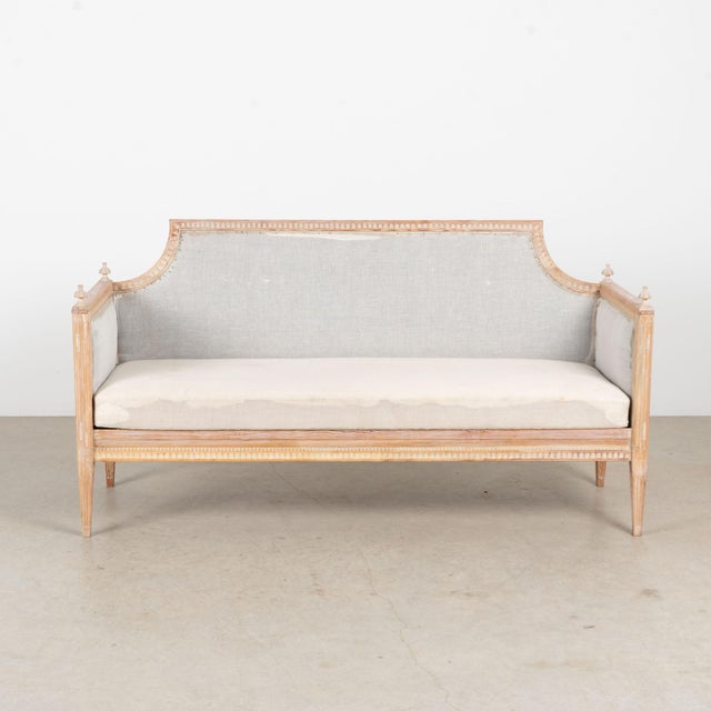 19th century Swedish Gustavian bench, crafted in pine with a highly distressed original white painted finish with gray...