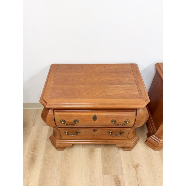 This gorgeous pair of vintage Century Furniture Provincial curvy nightstands are a beautifully crafted and ornate bedroom...