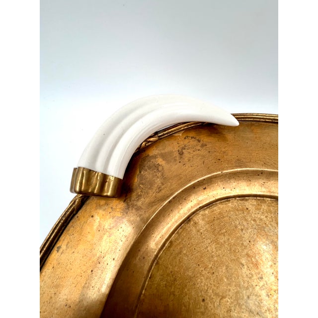 Vintage Italian Hollywood Regency Oval Statement Size Brass Tray With Faux Boar Tusk Handles and Cross Strap Trim For Sale In New York - Image 6 of 16