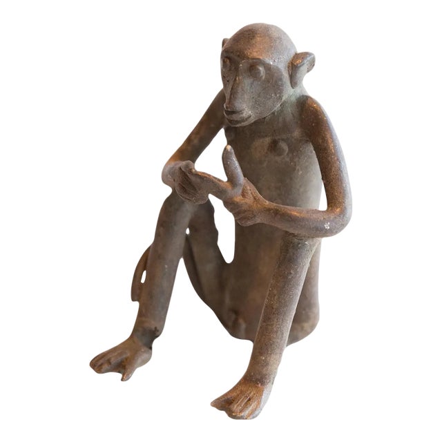 Vintage African Sitting Monkey With Banana Sculpture For Sale