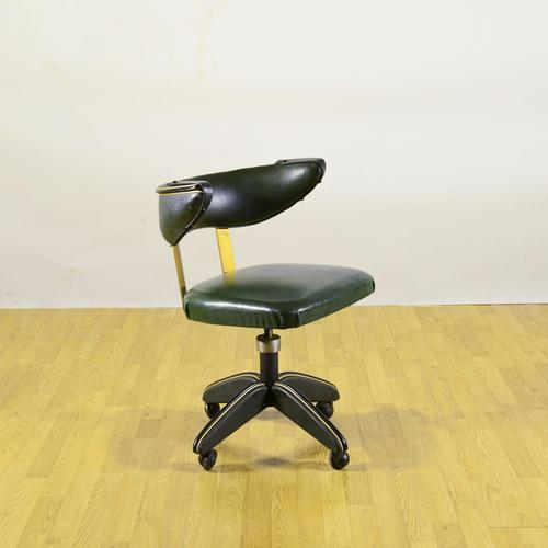 This vibrant vintage chair perfectly embodies the mid-century aesthetic of the 1960s, an era defined by the use of new...