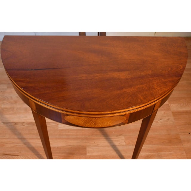 We are pleased to offer this beautiful Antique English Hipplewhite console table, from the 1910s. This table is made of...