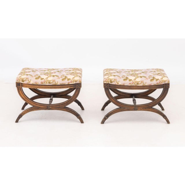 Pair of Louis XVI Style Upholstered Curule Stools, with rose garden pattern cushions. 16.5" H x 16.5" W x 16.5" D....