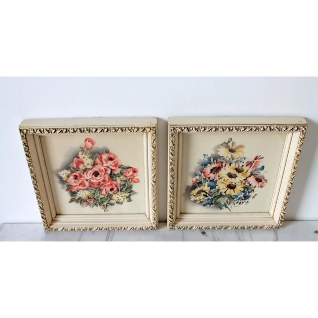 Vintage Pair of framed floral prints in ornate off white wood frames by Turner. Some age wear. Ready to hang.